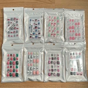 New 8 sets of Girls 24 piece Press On Nails each with tabs attached